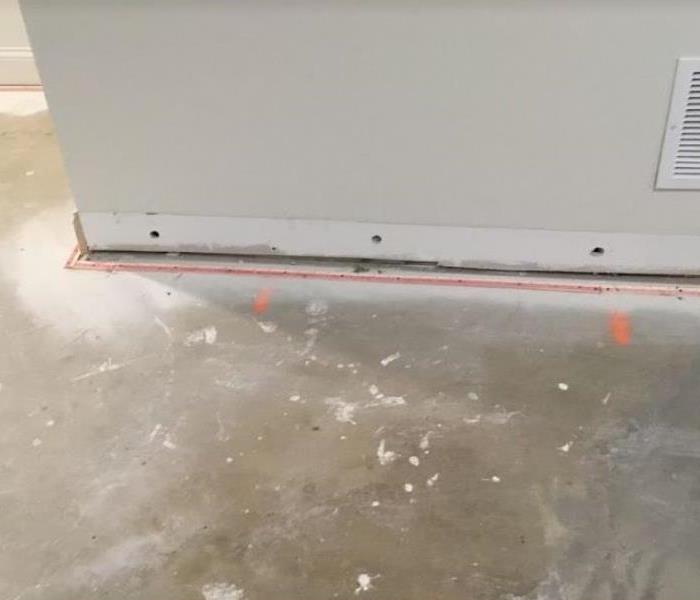 holes drilled in walls after water damage