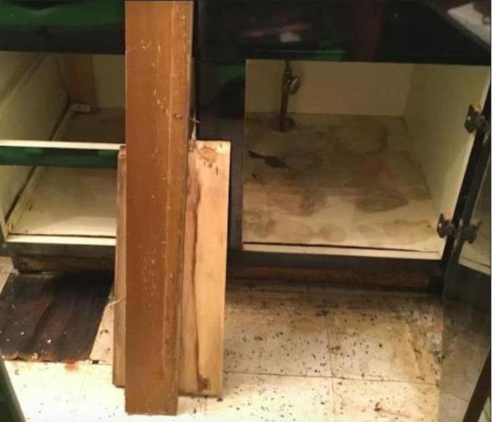 water damaged cabinet